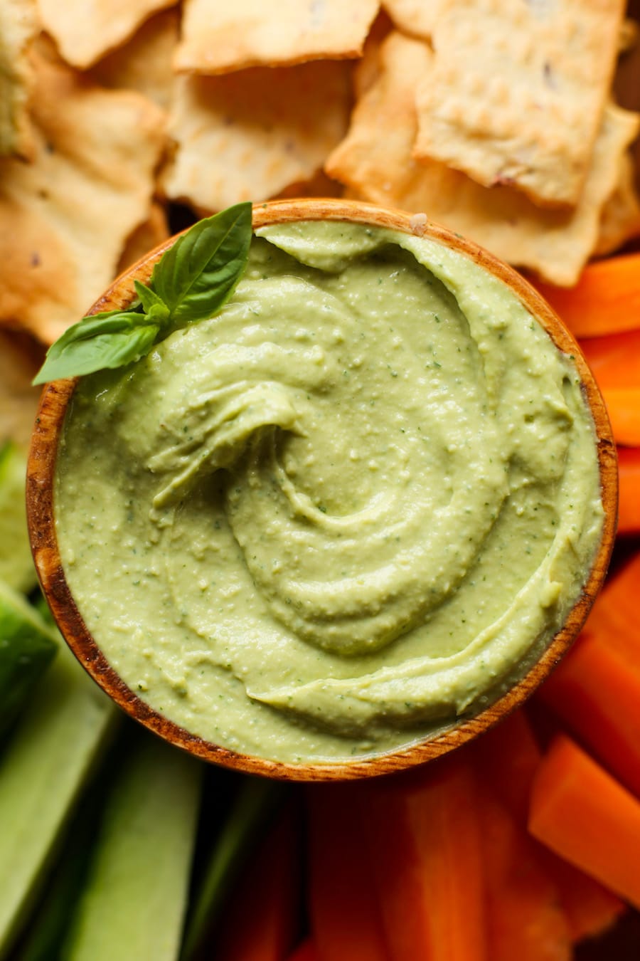 Creamy Basil Avocado Dip made with avocado, lemon juice, garlic, tahini, sea salt & fresh basil. | Gluten Free + Vegan + Paleo