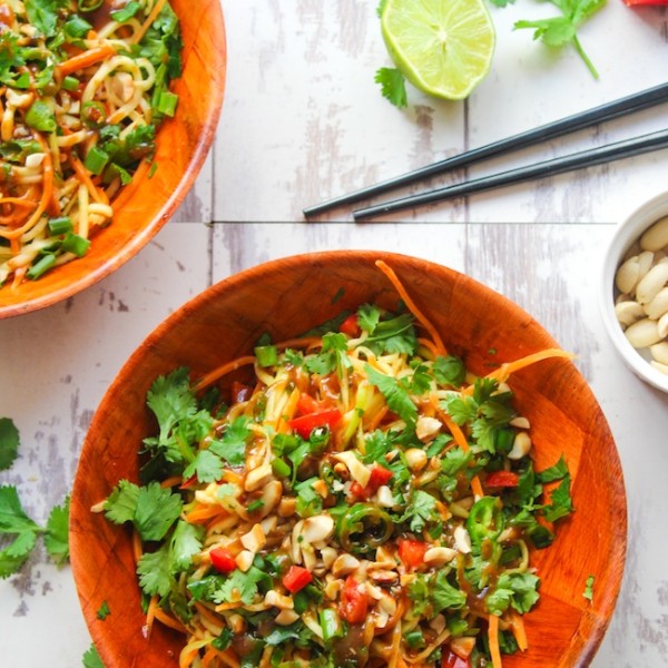 Veggie Pad Thai Salad with a sweet and savory peanut dressing - ready in 15 minutes or less. This spicy noodle bowl uses julienned zucchini in place of noodles making it perfect as light lunch or dinner side.