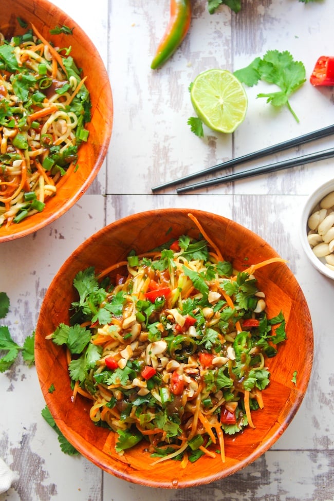 Veggie Pad Thai Salad with a sweet and savory peanut dressing - ready in 15 minutes or less. This spicy noodle bowl uses julienned zucchini in place of noodles making it perfect as light lunch or dinner side.