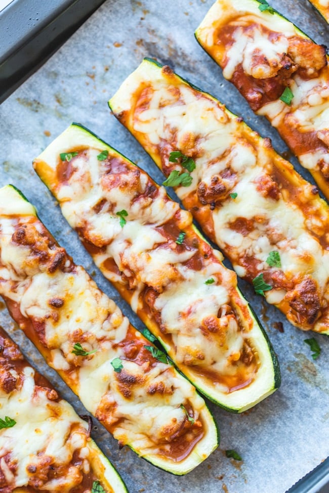 Zucchini Pizza Boats on a baking sheet