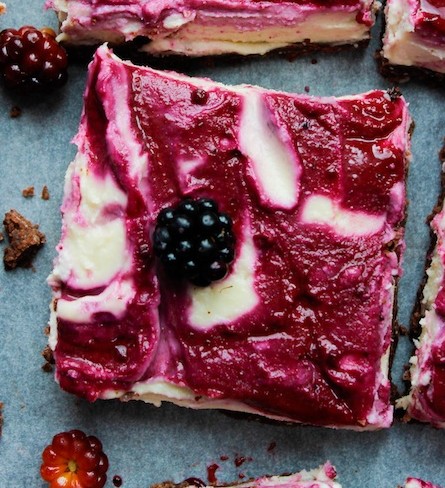 Raw Blackberry Cheesecake slices topped with fresh blackberries
