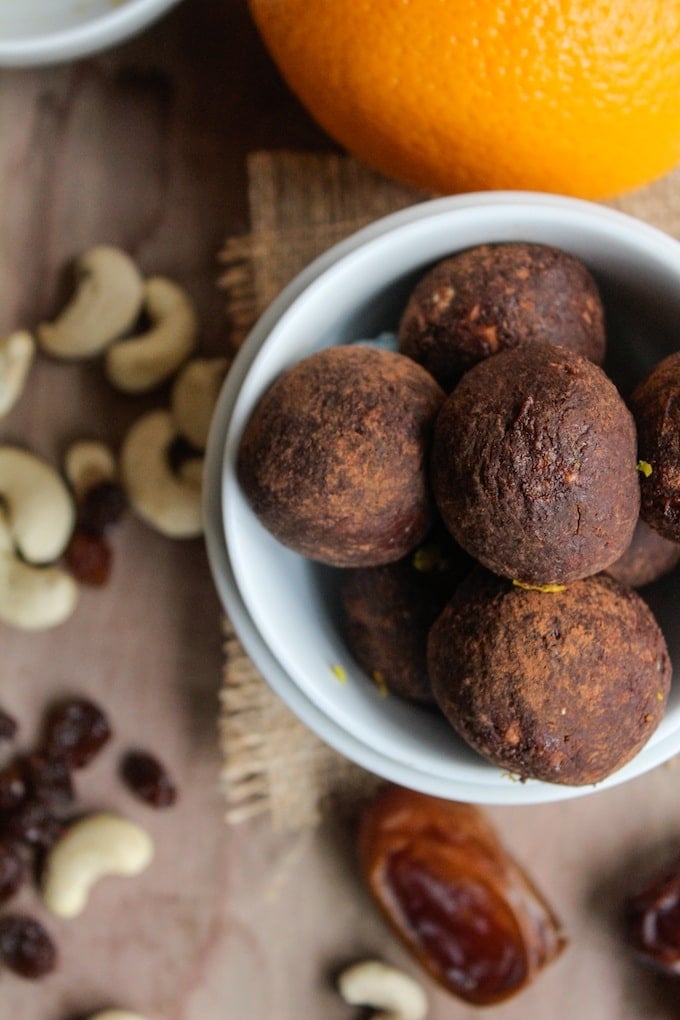 Homemade chocolate orange nakd bites made with just five ingredients - dates, raisins, cashews, cocoa, and a touch of zest. 