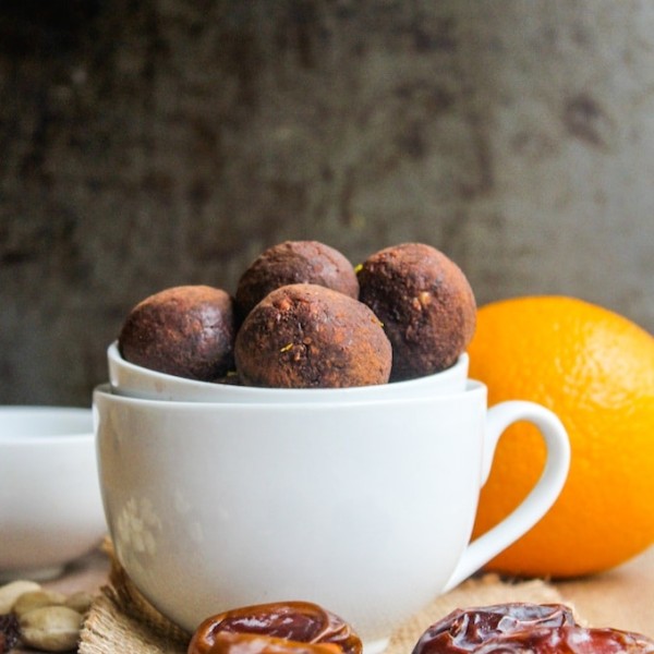 Homemade chocolate orange nakd bites made with just five ingredients – dates, raisins, cashews, cocoa, and a touch of orange zest.