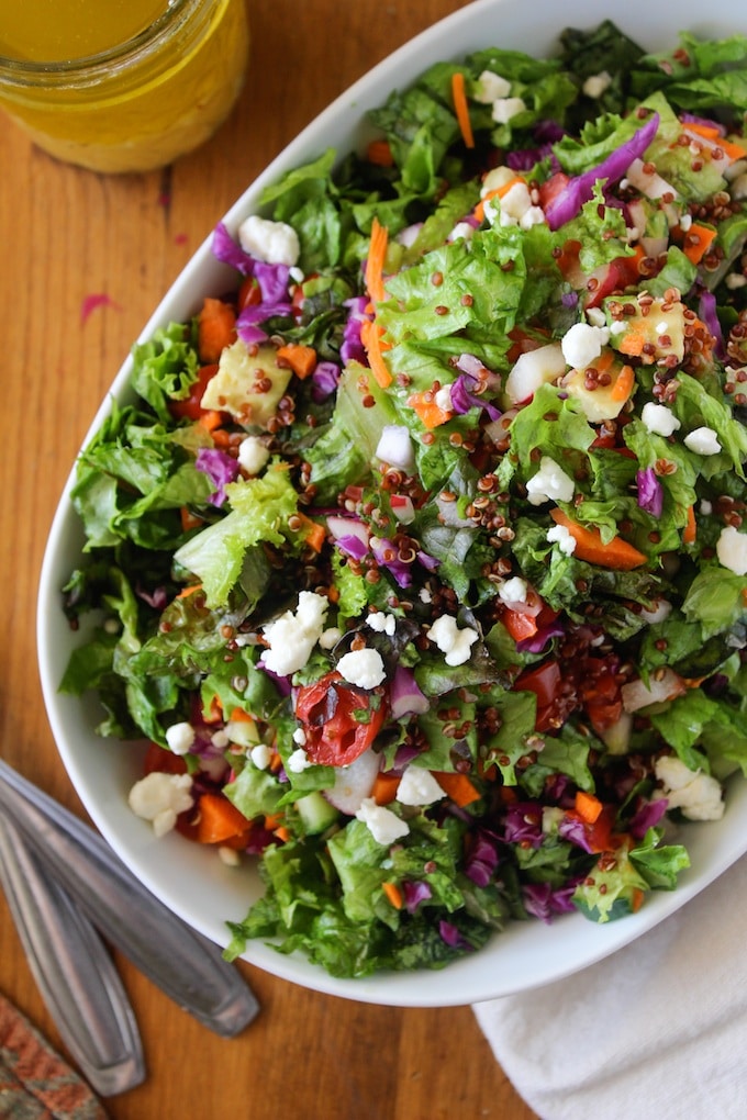 quinoa lettuce salad in a serving dish