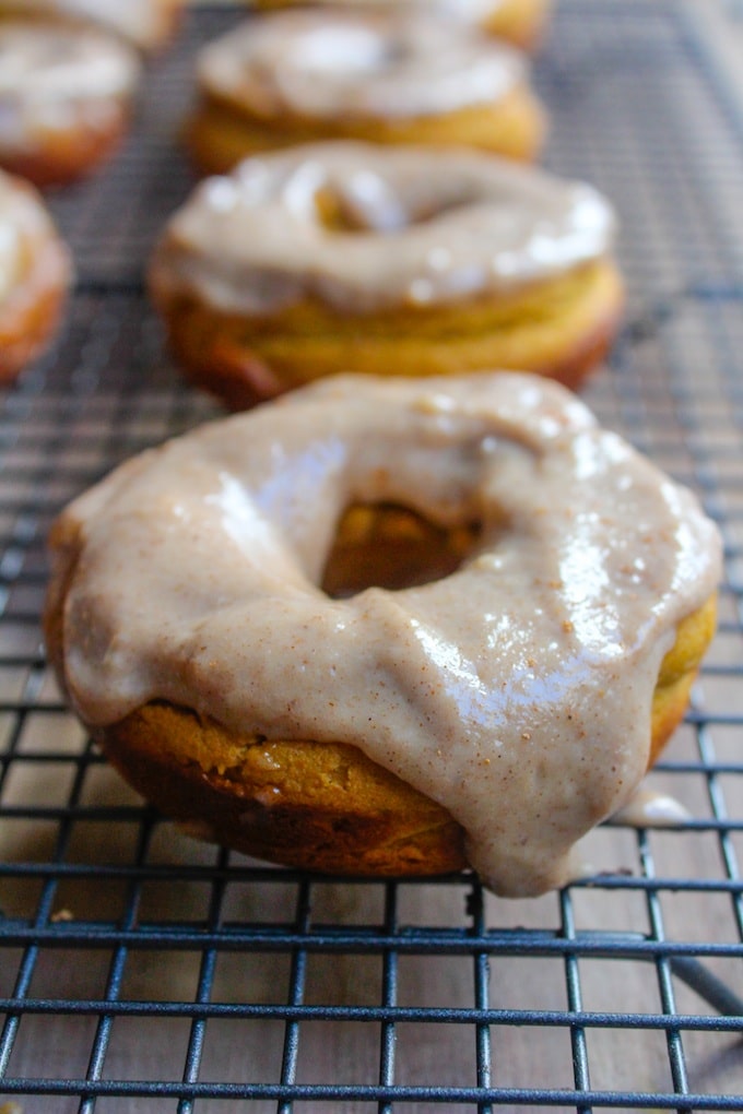 Baked paleo pumpkin spice donuts with a cashew cream maple frosting - in case you need a little motivation to get up in the morning! 