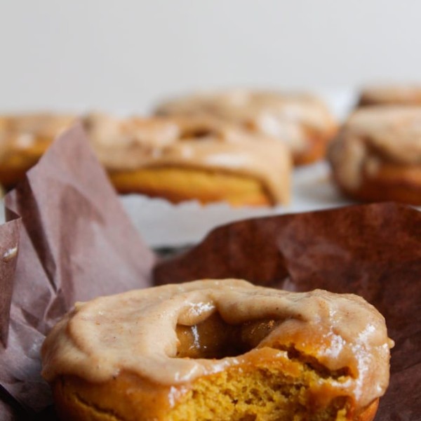 Baked paleo pumpkin spice donuts with a cashew cream maple frosting - in case you need a little motivation to get up in the morning!