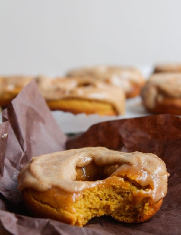 Baked paleo pumpkin spice donuts with a cashew cream maple frosting - in case you need a little motivation to get up in the morning!