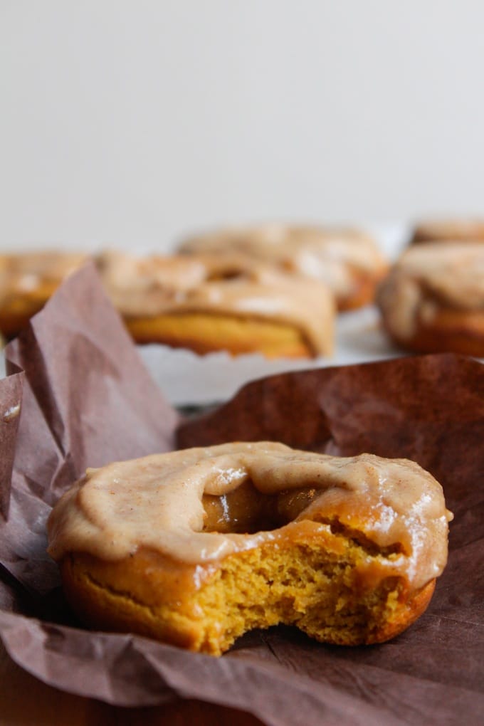 Baked paleo pumpkin spice donuts with a cashew cream maple frosting - in case you need a little motivation to get up in the morning!