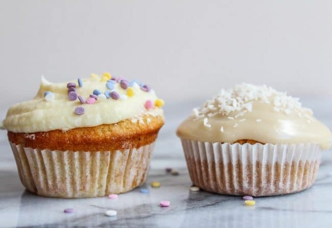 two Gluten Free Single Serve Vanilla Cupcakes next to each other