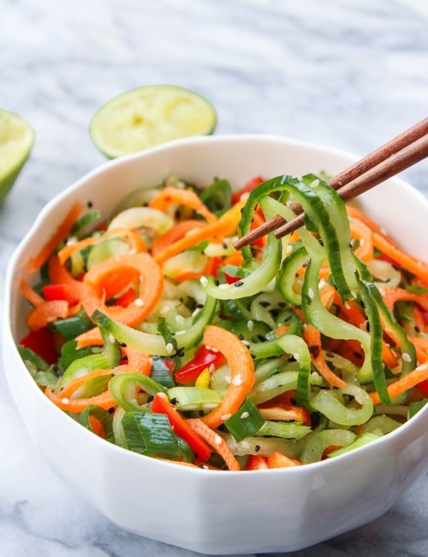 Asian Cucumber Sesame Salad in a bowl with chopsticks