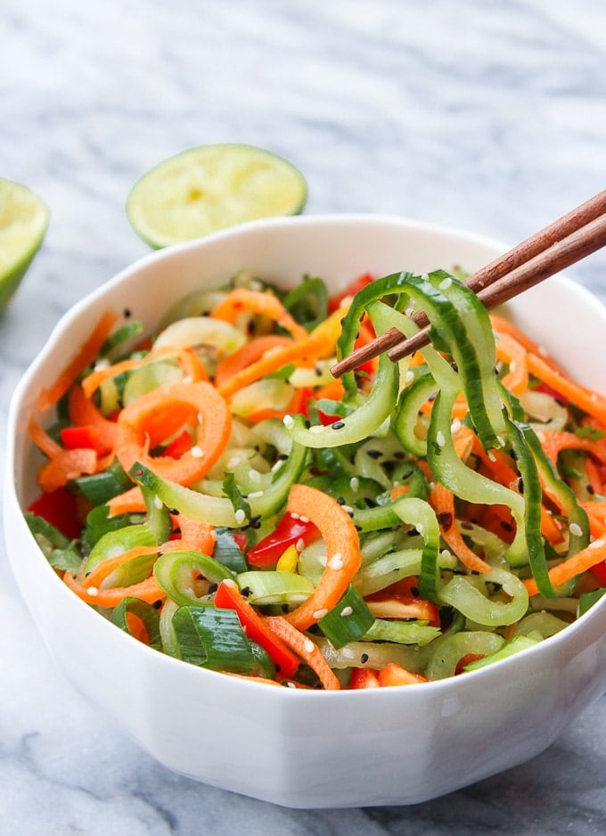 Asian Cucumber Sesame Salad in a bowl with chopsticks