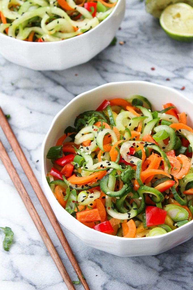 Asian Cucumber Sesame Salad in a bowl topped with black sesame seeds
