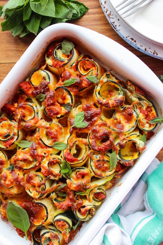 Vegetarian Zucchini Lasagna Rolls filled with spinach, ricotta, and a chunky homemade marinara sauce. Gluten free, Grain Free, Low Carb
