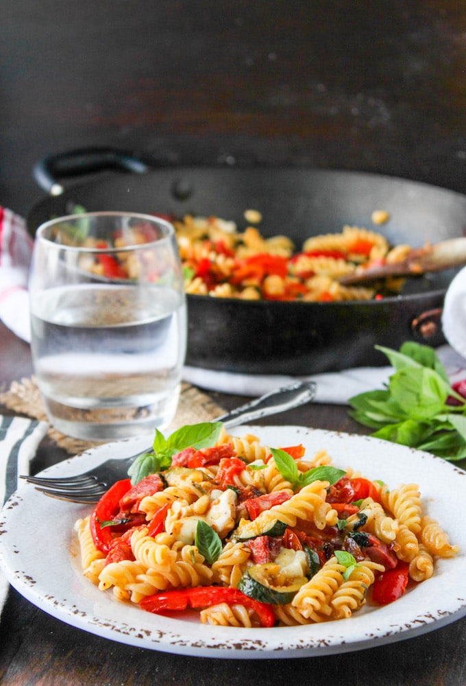 Chorizo & Roasted Veggie Pasta Salad - packed with fresh herbs, mozzarella, and garden vegetables over gluten free pasta! 