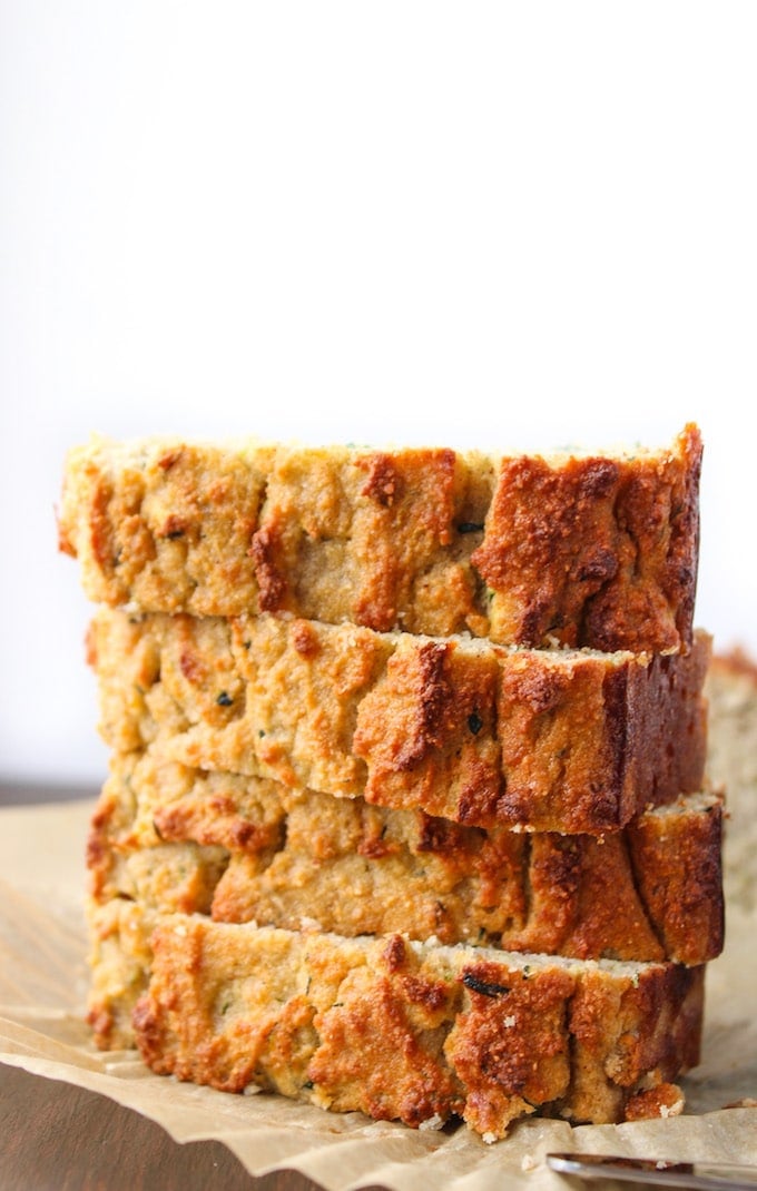 Four Paleo Zucchini Bread slices stacked on top of each other