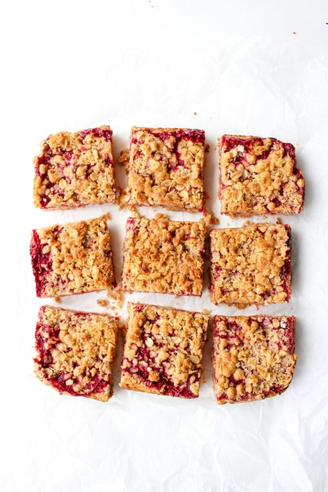 Raspberry Crumble Bars - double the crumble surrounding a sweet and tangy raspberry fruit filling. Gluten free + Low FODMAP + Vegan | www.asaucykitchen.com
