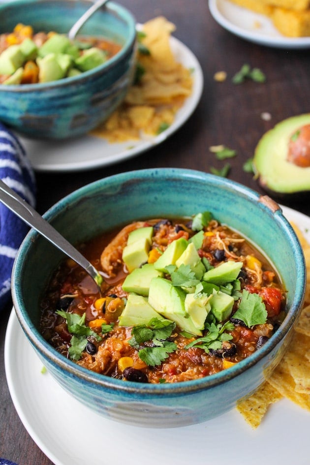 Hearty chicken enchilada soup with quinoa - just a few minutes of prep to make in the instant pot or slower cooker