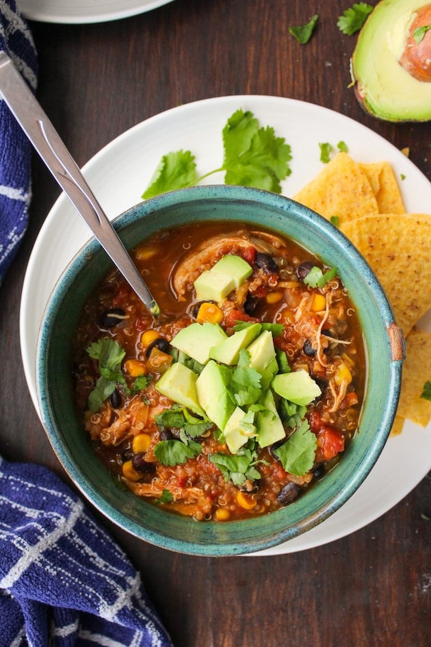 Hearty chicken enchilada soup with quinoa - just a few minutes of prep to make in the instant pot or slower cooker