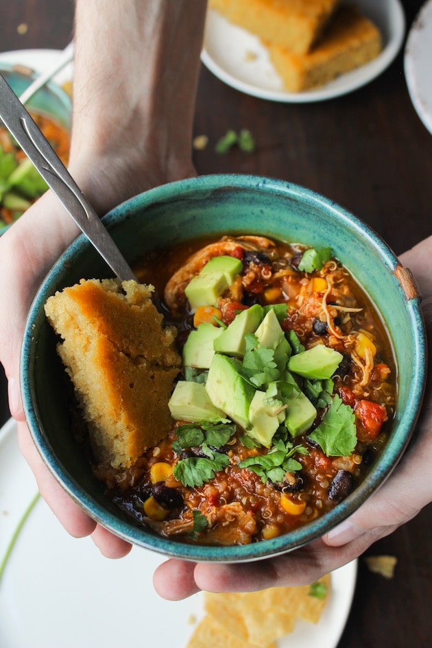 Hearty chicken enchilada soup with quinoa – just a few minutes of prep to make in the instant pot or slower cooker then sit back and enjoy!