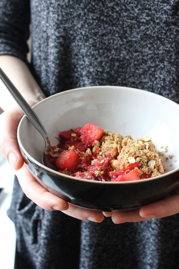 hands holding Cranberry Apple Crumble 