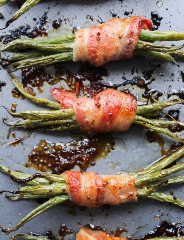 Honey Mustard Bacon Wrapped Green Beens on a baking sheet