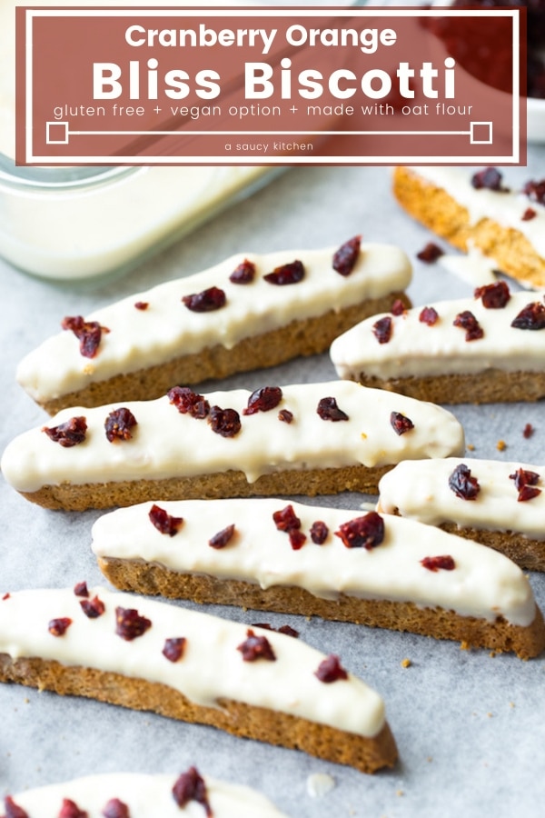 Cranberry Orange Gluten Free Biscotti - gently sweetened and lightly spiced oat flour biscotti dipped in melted white chocolate and topped with chopped cranberries #glutenfree & #nutfree #cranberry #cranberryorange #biscotti