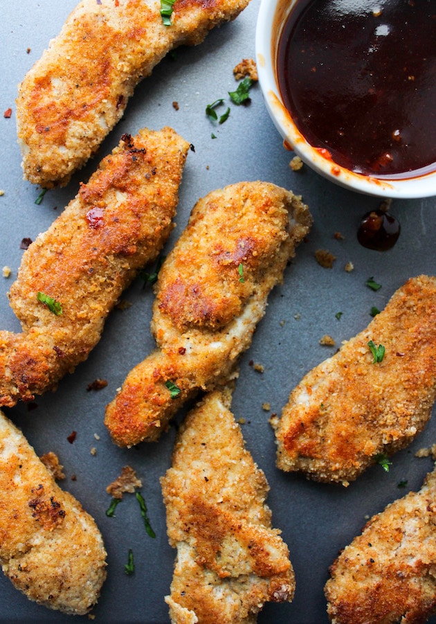 Paleo Chicken Tenders crusted in a almond flour blend and mixed with Chinese five spice with a sweet & spicy Asian dipping sauce | Gluten Free + Dairy Free + Low FODMAP option