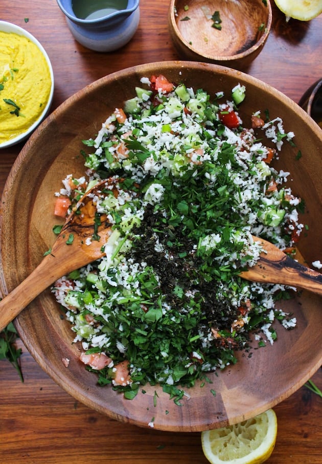 Cauliflower Tabbouleh - a Middle Eastern classic made gluten free | Fresh vegetables & herbs chopped, mixed and dressed in fresh lemon juice | Vegan + Paleo + Whole 30