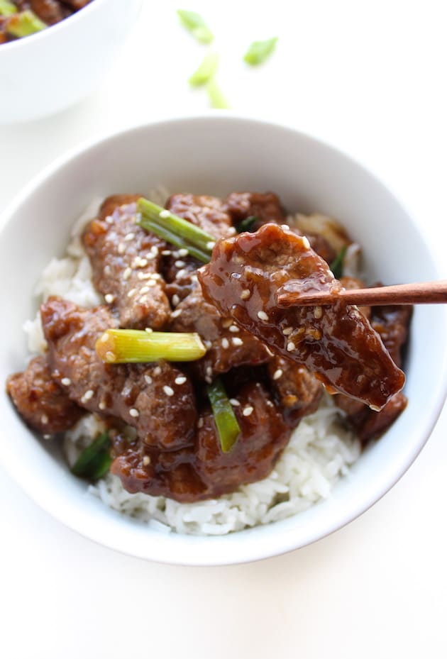 chop sticks holding up Paleo Mongolian Beef 