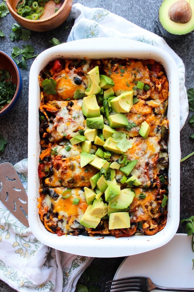 Spiralized Sweet Potato Enchilada Casserole loaded with veggies, black beans and doused in a simple homemade enchilada sauce | Gluten Free + Vegetarian 