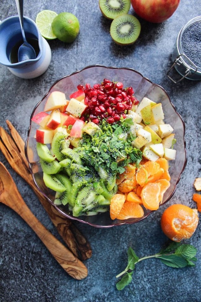 winter fruit salad in a bowl before it's mixed together