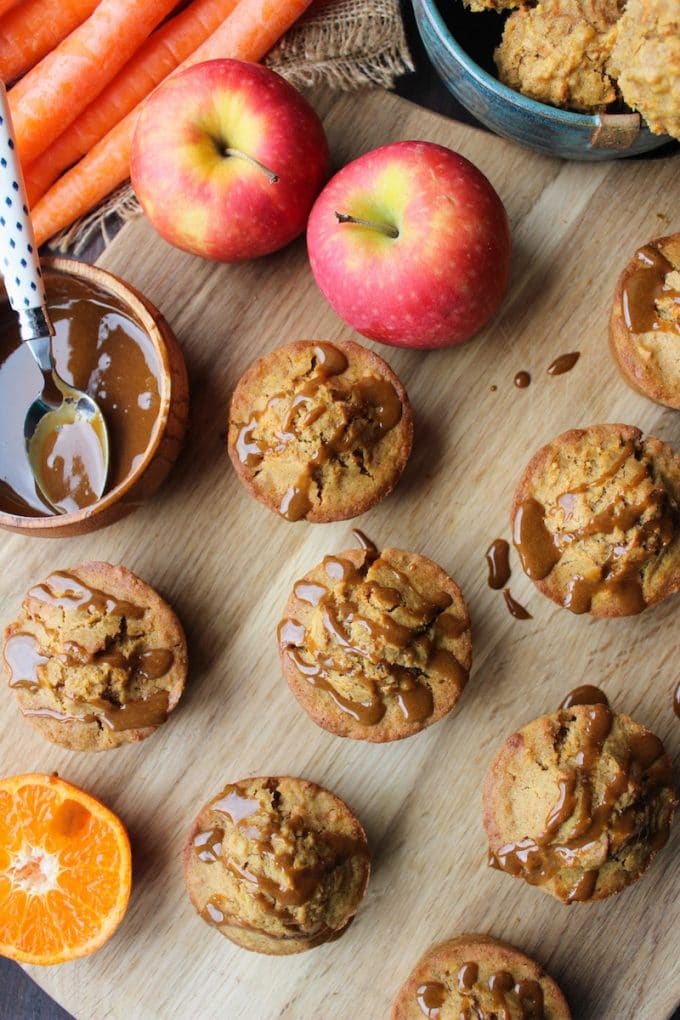 Carrot Apple Muffins with an orange maple glaze drizzled over top