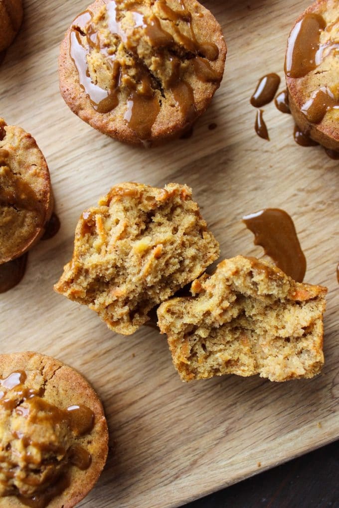 a Carrot Apple Muffin cut in half exposing the soft inside