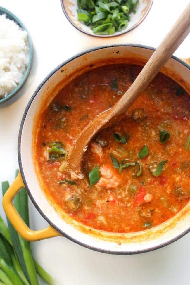 One pot Fast Seafood Gumbo in a soup pot with a ladle 