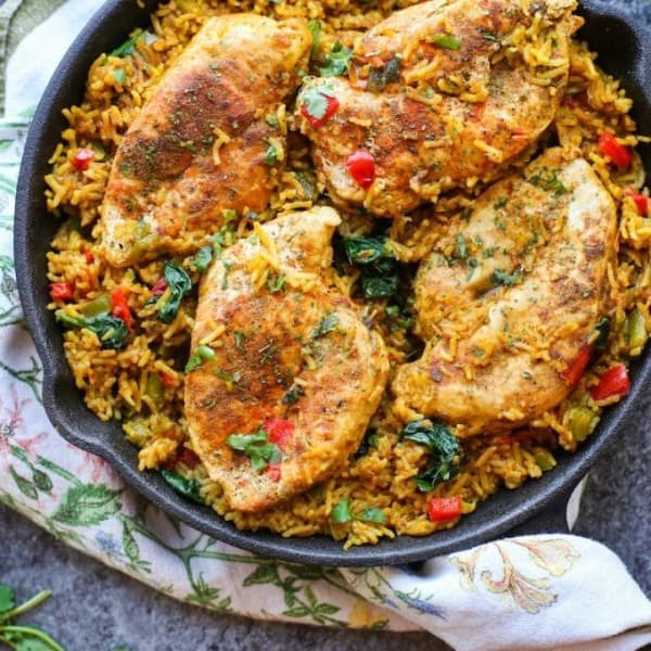 One Pot Low FODMAP Chicken and Rice in a cast iron skillet