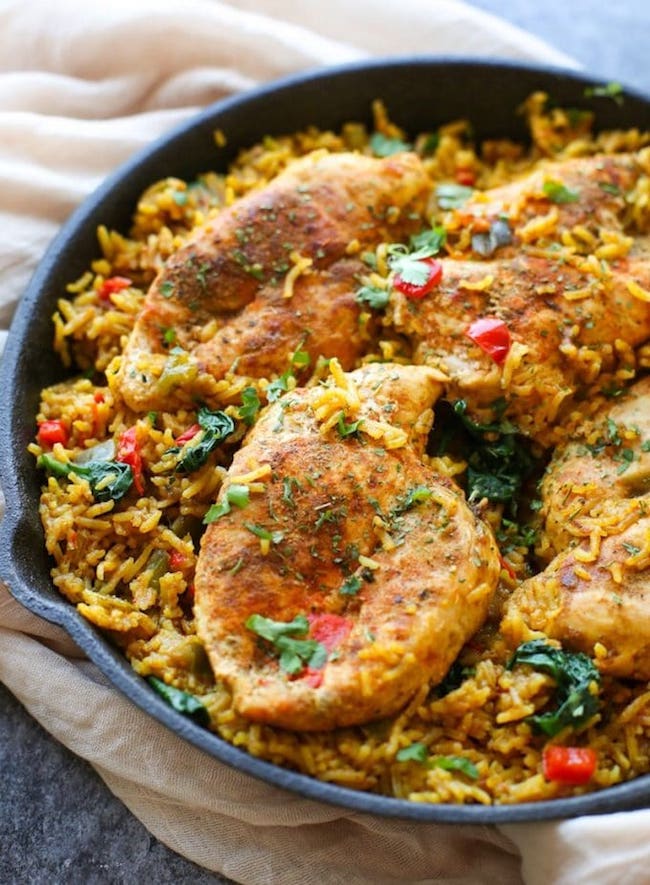 One Pot Low FODMAP Chicken and Rice (Khichdi Inspired) in a pan topped with cilantro