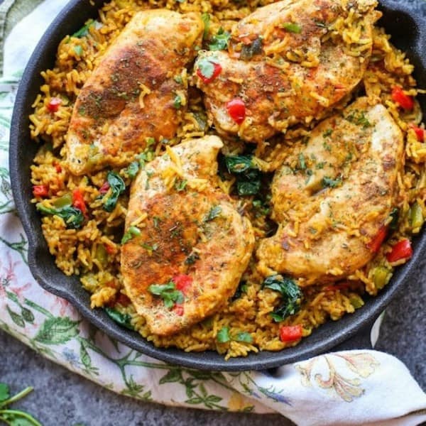 One Pot Low FODMAP Chicken and Rice (Khichdi Inspired) in a cast iron pan