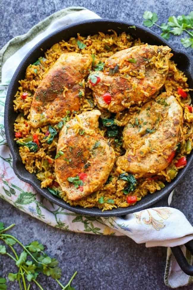 One Pot Low FODMAP Chicken and Rice (Khichdi Inspired) in a cast iron pan