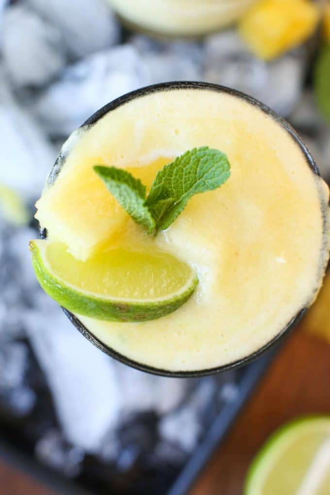 Pineapple, freshly squeezed lime juice, tequila and triple sec are combined in these light, naturally sweetened & refreshing Frozen Pineapple Margaritas!