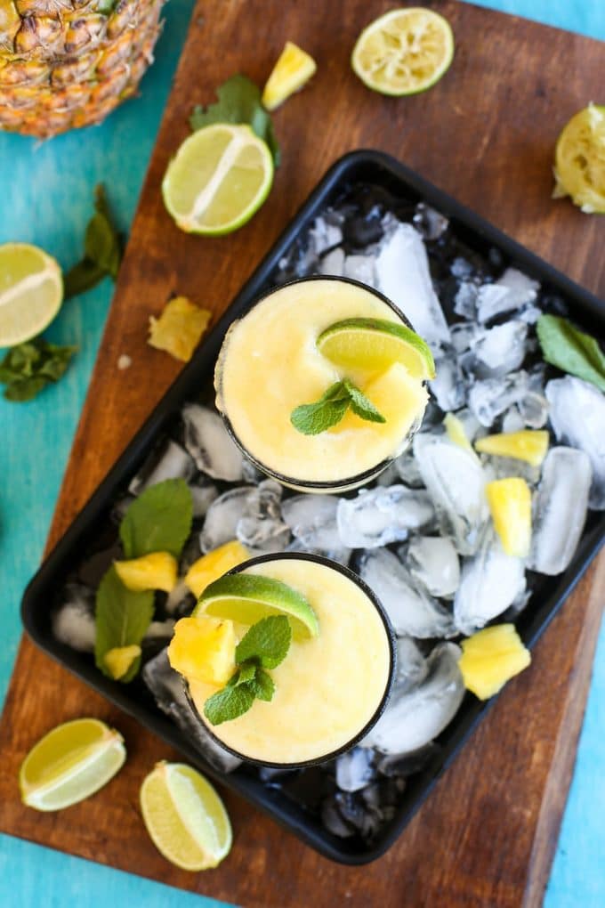 Pineapple, freshly squeezed lime juice, tequila Pineapple, freshly squeezed lime juice, tequila and triple sec are combined in these light, naturally sweetened & refreshing Frozen Pineapple Margaritas! triple sec are combined in these light, naturally sweetened & refreshing Frozen Pineapple Margarita!