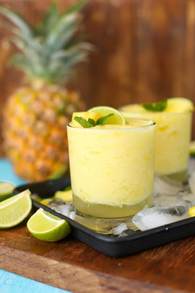 Pineapple, freshly squeezed lime juice, tequila and triple sec are combined in these light, naturally sweetened & refreshing Frozen Pineapple Margaritas!