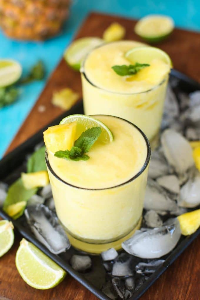 Pineapple, freshly squeezed lime juice, tequila and triple sec are combined in these light, naturally sweetened & refreshing Frozen Pineapple Margaritas!