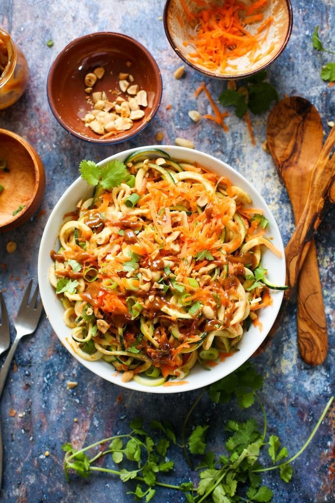 15 minute Raw Peanut Zoodle Salad with spiralized zucchini, shredded carrots and a simple peanut dressing. | Gluten Free + Vegan + Paleo Option 