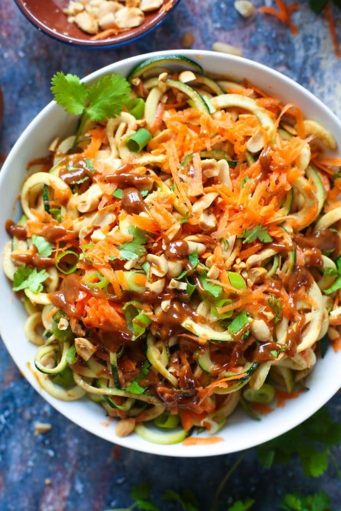 15 minute Raw Peanut Zoodle Salad with spiralized zucchini, shredded carrots and a simple peanut dressing. | Gluten Free + Vegan + Paleo Option 