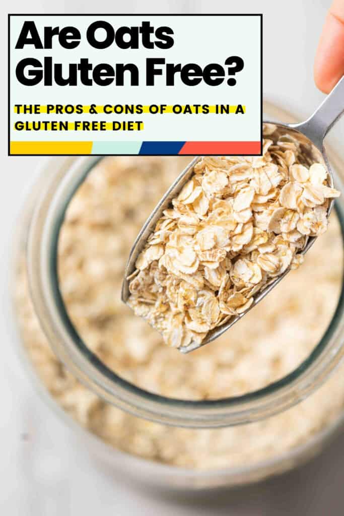 'Are Oats Gluten Free? The pros & cons of oats on a gluten free diet' - raw rolled oats in a scoop