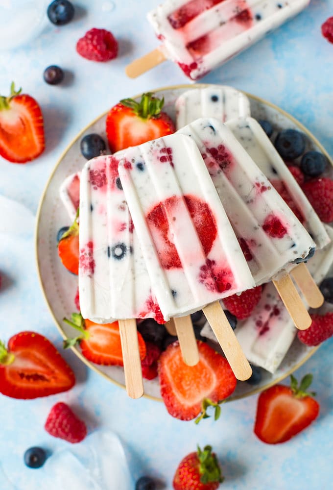 Fruity Chia Coconut Popsicles - 5 ingredients and lightly sweetened popsicles speckled with chia seeds and mixed berries | Gluten Free + Vegan + Paleo