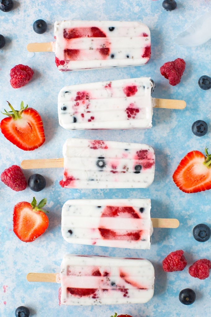Fruity Chia Coconut Popsicles - 5 ingredients and lightly sweetened popsicles speckled with chia seeds and mixed berries | Gluten Free + Vegan + Paleo