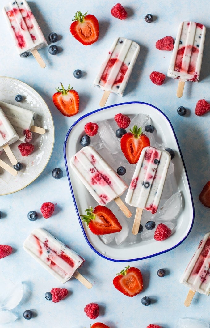 Fruity Chia Coconut Popsicles - 5 ingredients and lightly sweetened popsicles speckled with chia seeds and mixed berries | Gluten Free + Vegan + Paleo