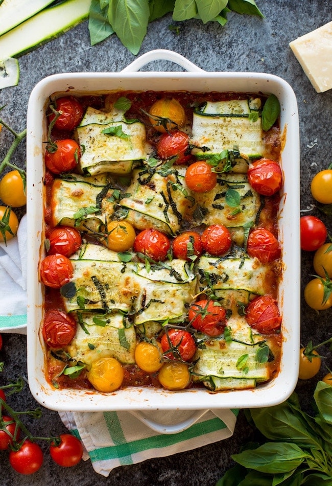 zucchini ravioli in a pan with cherry tomatoes 