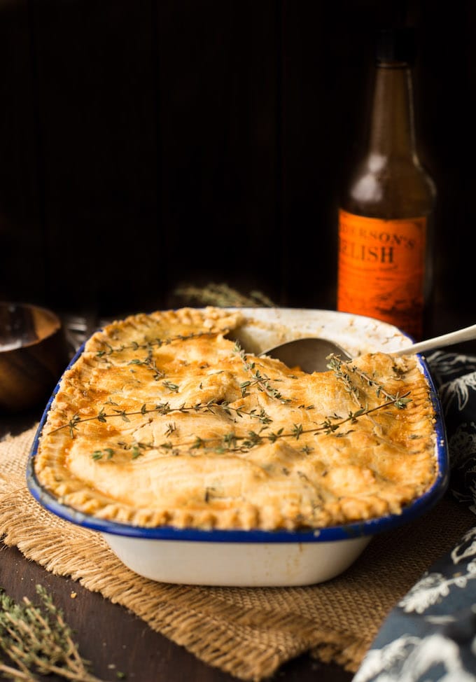 Lightened up Gluten Free Chicken Pot Pie loaded with veggies & topped with an herby crust | Dairy Free Option Available